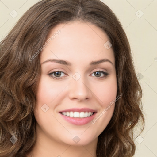 Joyful white young-adult female with long  brown hair and green eyes