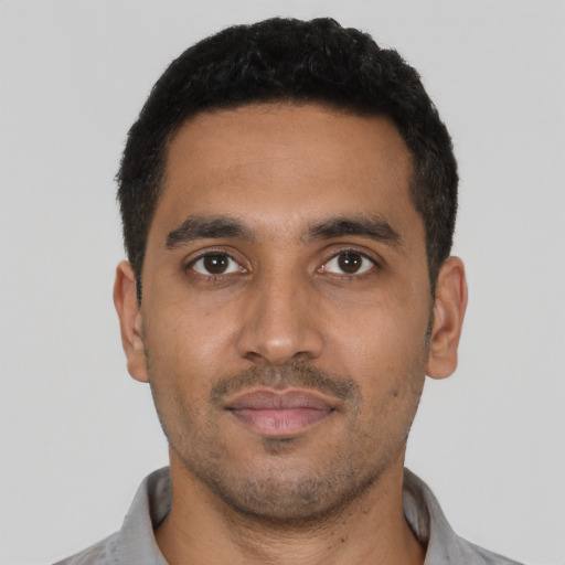 Neutral latino young-adult male with short  black hair and brown eyes