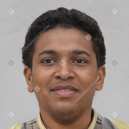Joyful latino young-adult male with short  brown hair and brown eyes