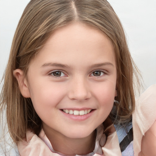 Joyful white child female with medium  brown hair and grey eyes