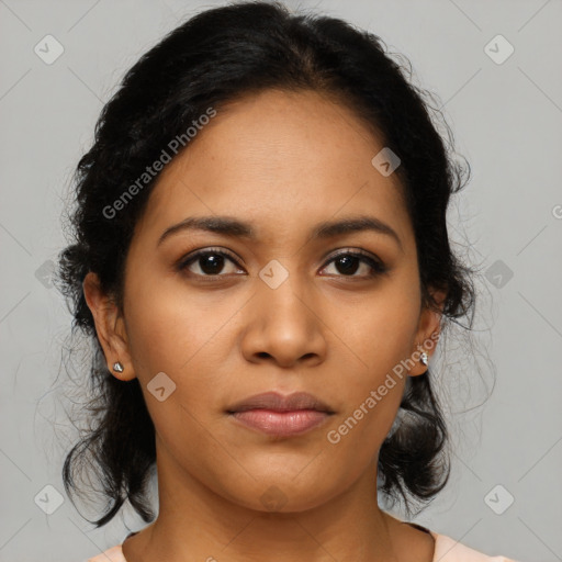 Joyful latino young-adult female with medium  brown hair and brown eyes