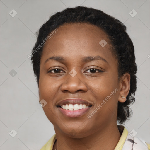 Joyful latino young-adult female with short  black hair and brown eyes