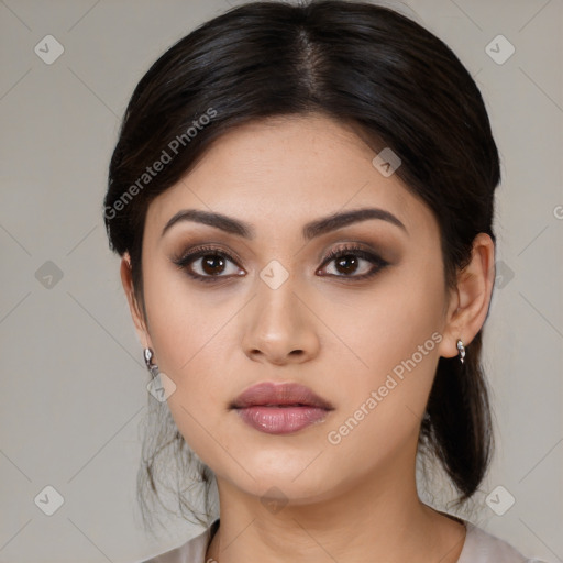 Neutral asian young-adult female with medium  brown hair and brown eyes