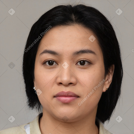 Joyful asian young-adult female with medium  black hair and brown eyes