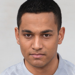 Neutral white young-adult male with short  black hair and brown eyes