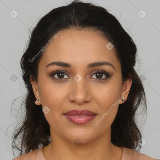 Joyful latino young-adult female with medium  brown hair and brown eyes