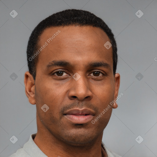 Neutral latino young-adult male with short  brown hair and brown eyes