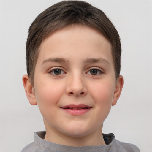 Joyful white child female with short  brown hair and brown eyes