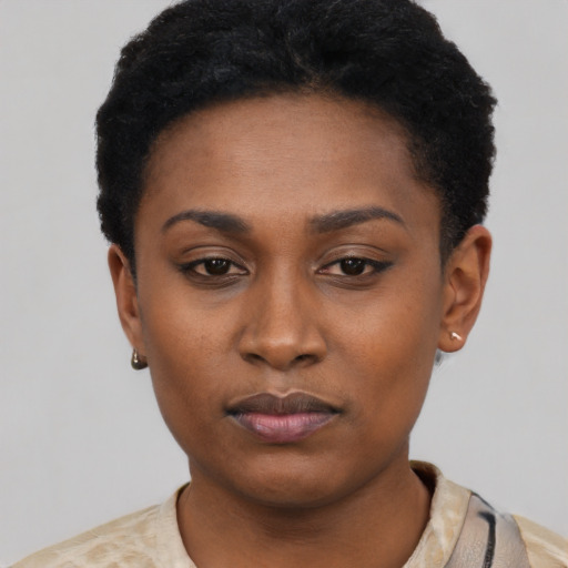 Neutral latino young-adult female with short  black hair and brown eyes