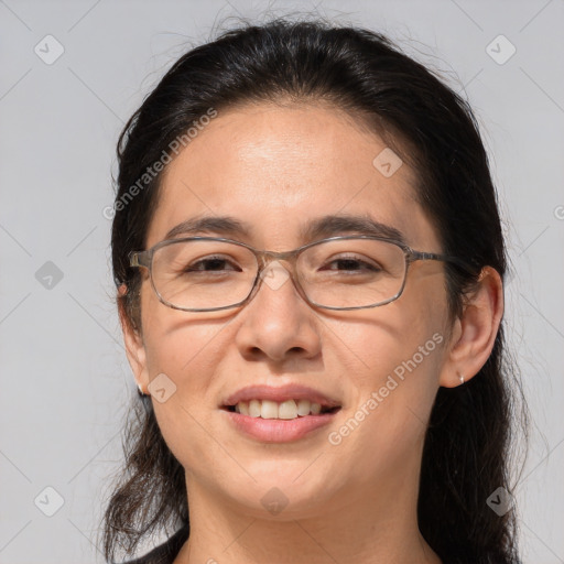 Joyful white adult female with medium  brown hair and brown eyes