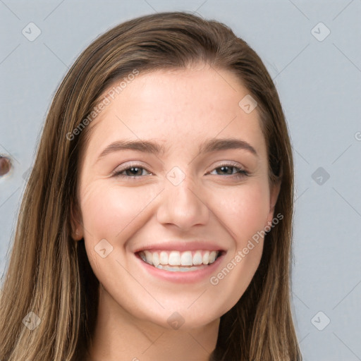 Joyful white young-adult female with long  brown hair and grey eyes