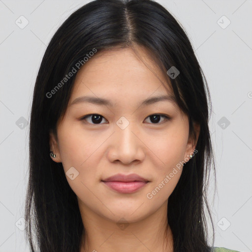 Joyful asian young-adult female with long  brown hair and brown eyes