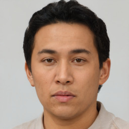 Neutral asian young-adult male with short  brown hair and brown eyes