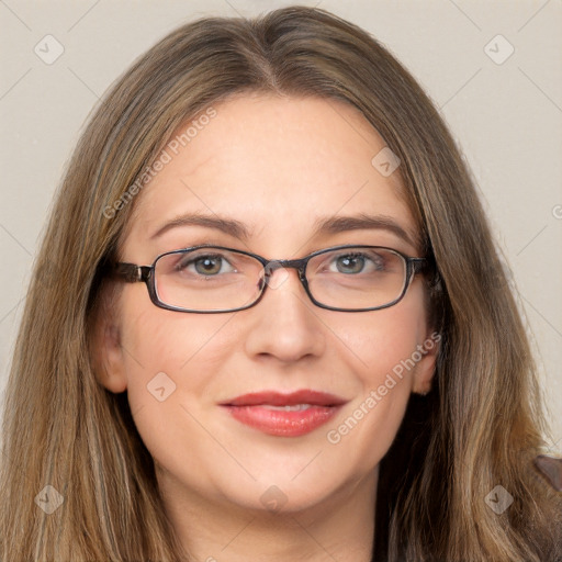 Joyful white adult female with long  brown hair and brown eyes