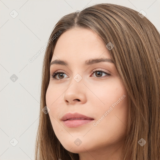 Neutral white young-adult female with long  brown hair and brown eyes