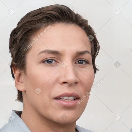 Joyful white young-adult female with short  brown hair and grey eyes