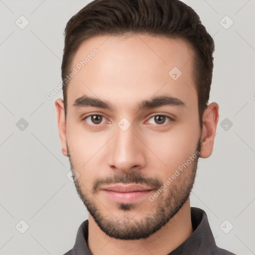 Neutral white young-adult male with short  brown hair and brown eyes