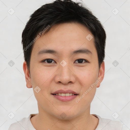 Joyful asian young-adult male with short  brown hair and brown eyes