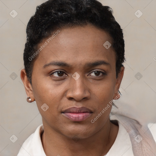 Joyful black young-adult female with short  brown hair and brown eyes