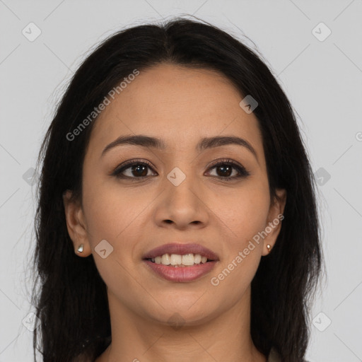 Joyful latino young-adult female with long  brown hair and brown eyes