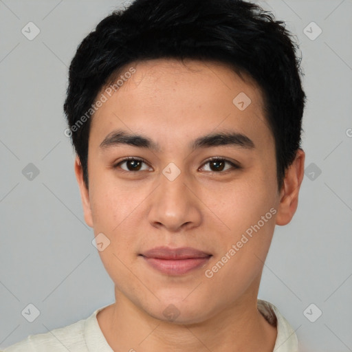 Joyful asian young-adult male with short  black hair and brown eyes