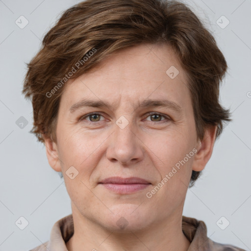 Joyful white adult male with short  brown hair and grey eyes