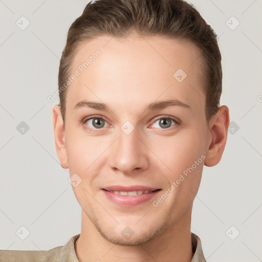 Joyful white young-adult female with short  brown hair and grey eyes