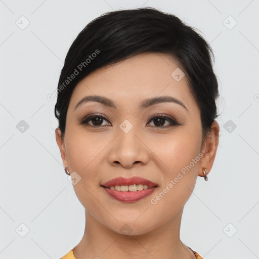 Joyful asian young-adult female with short  black hair and brown eyes