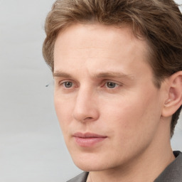 Neutral white young-adult male with short  brown hair and grey eyes