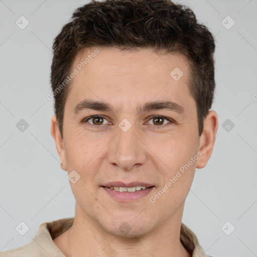 Joyful white young-adult male with short  brown hair and brown eyes