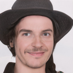 Joyful white young-adult male with medium  brown hair and brown eyes
