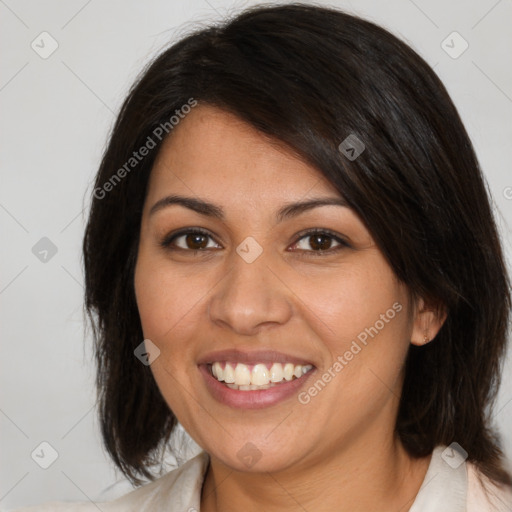 Joyful latino young-adult female with medium  brown hair and brown eyes