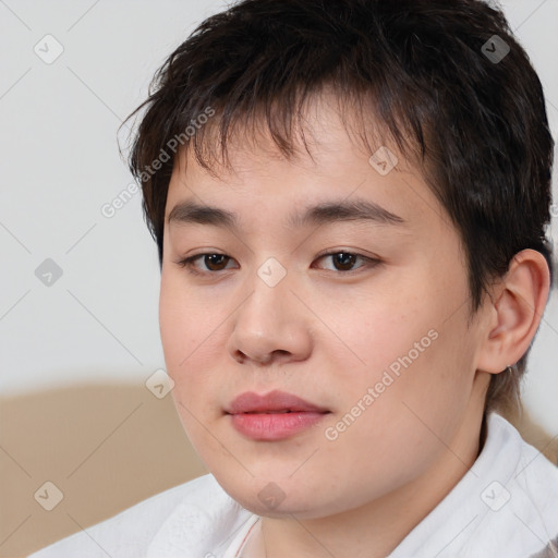 Joyful white child male with short  brown hair and brown eyes