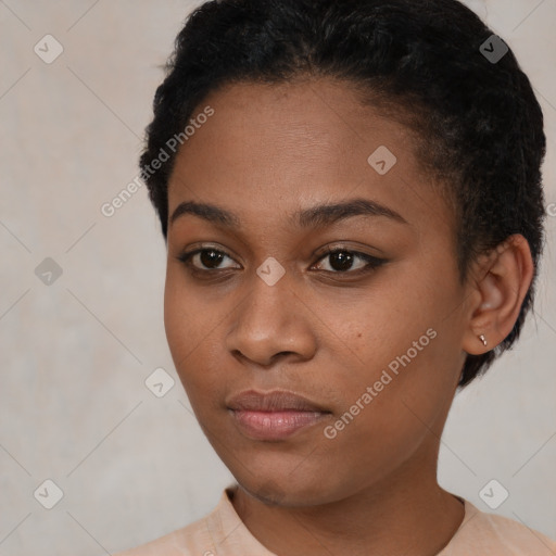 Neutral black young-adult female with short  black hair and brown eyes