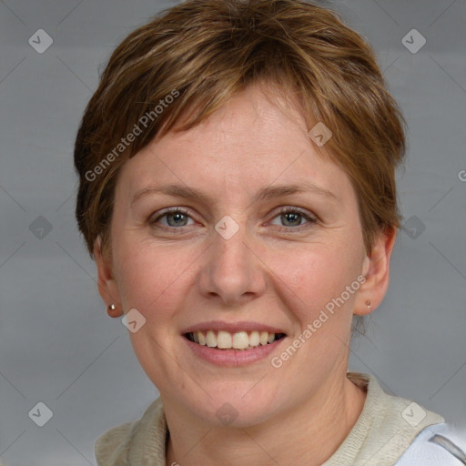 Joyful white adult female with medium  brown hair and grey eyes