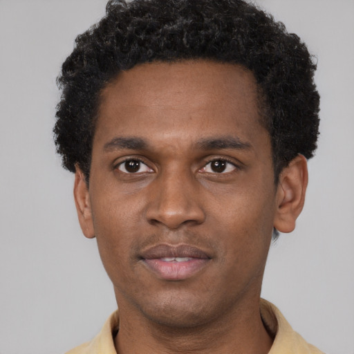 Neutral black young-adult male with short  brown hair and brown eyes