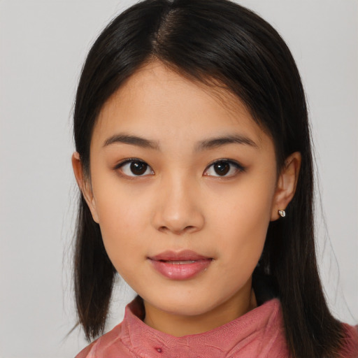 Neutral asian young-adult female with medium  brown hair and brown eyes