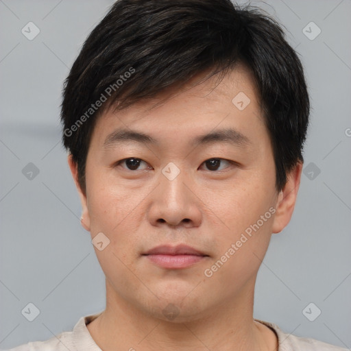 Neutral asian young-adult male with short  black hair and brown eyes