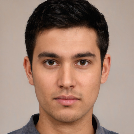 Neutral white young-adult male with short  black hair and brown eyes