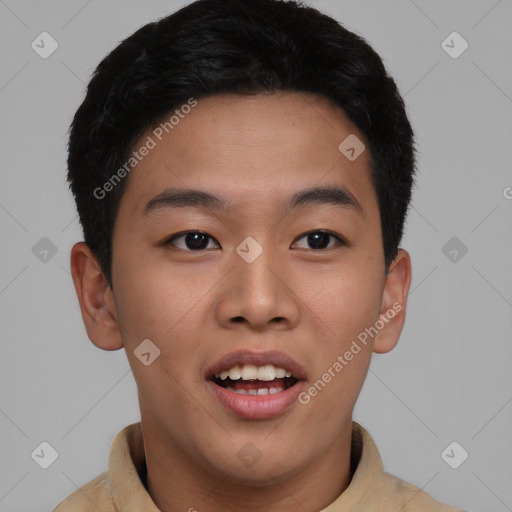 Joyful asian young-adult male with short  brown hair and brown eyes