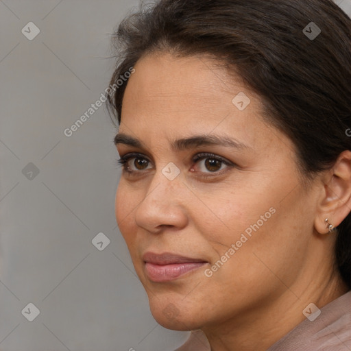 Joyful white adult female with short  brown hair and brown eyes