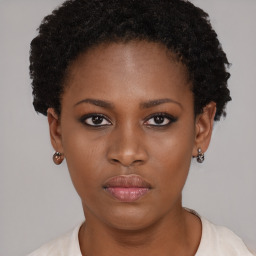 Neutral black young-adult female with short  brown hair and brown eyes