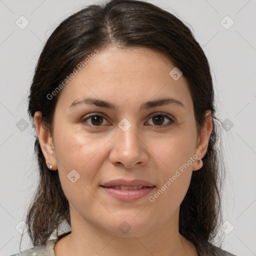 Joyful white young-adult female with medium  brown hair and brown eyes