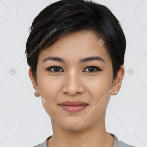 Joyful asian young-adult female with short  black hair and brown eyes