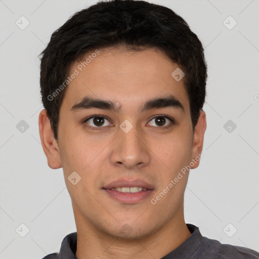 Joyful latino young-adult male with short  brown hair and brown eyes