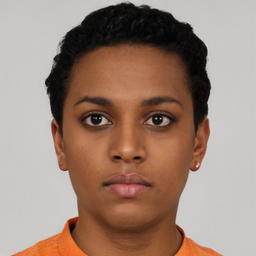 Neutral latino young-adult female with short  black hair and brown eyes