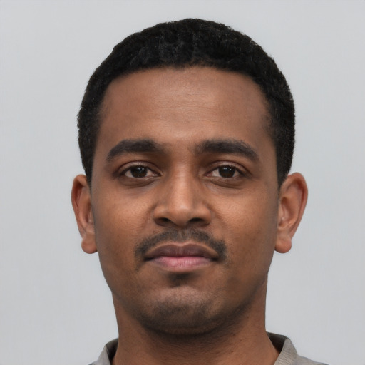 Neutral black young-adult male with short  black hair and brown eyes