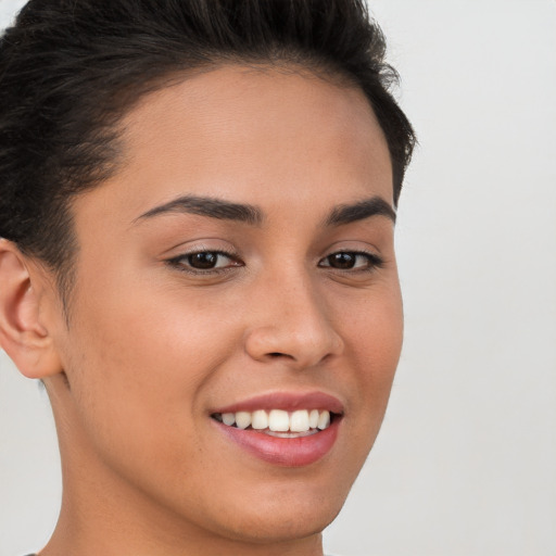 Joyful white young-adult female with short  brown hair and brown eyes