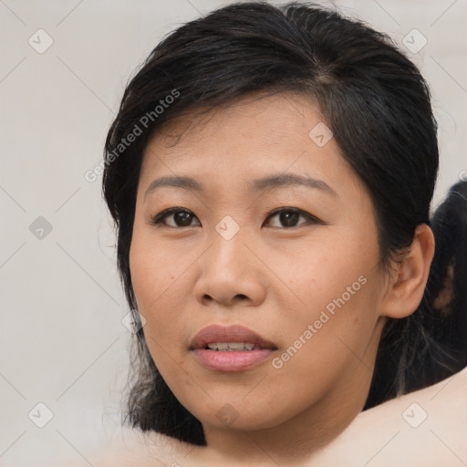 Joyful asian young-adult female with medium  brown hair and brown eyes