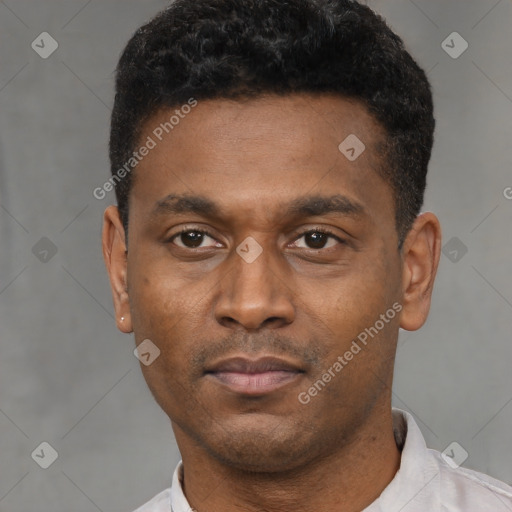 Neutral latino young-adult male with short  black hair and brown eyes